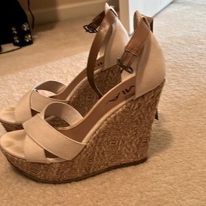 White wedge sandals with tan ankle strap